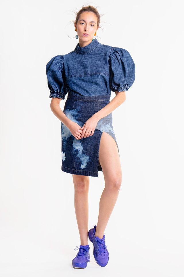 FALDA DE MEZCLILLA CON APERTURA - NAKED BOUTIQUE